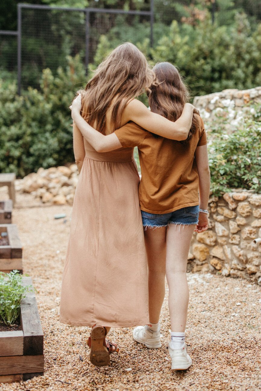 Mother daughter embrace_breast self exam